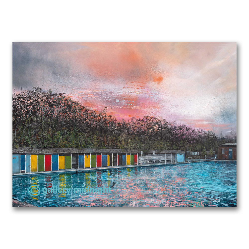 Limited edition art print of Tooting Bec Lido at sunrise with colourful changing cabins reflected in the water